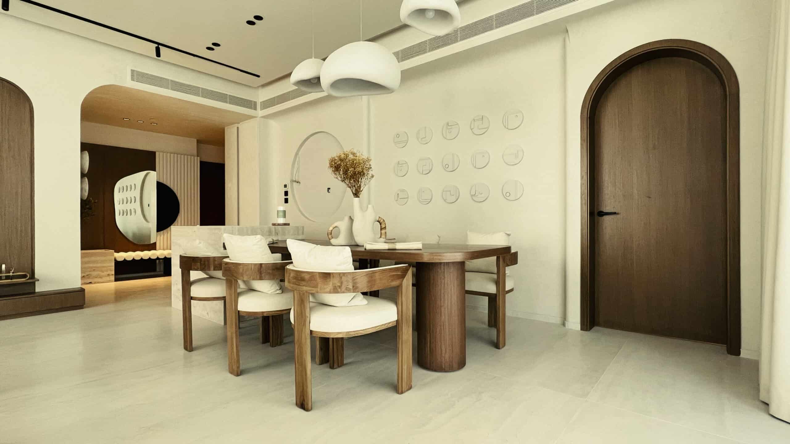Elegant dining room featuring a wooden table, white chairs, and modern decor in a bright, minimalist.
